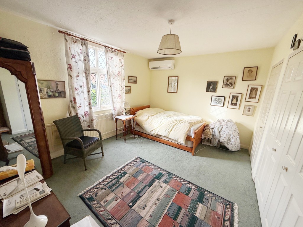 Lot: 155 - DETACHED BUNGALOW FOR IMPROVEMENT IN POPULAR LOCATION - Bedroom two with wardrobes and window to the front